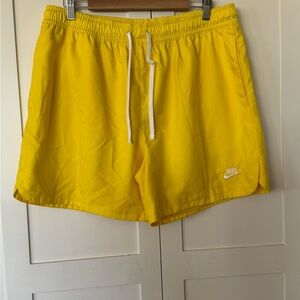 Nike men’s lined Yellow swim shorts